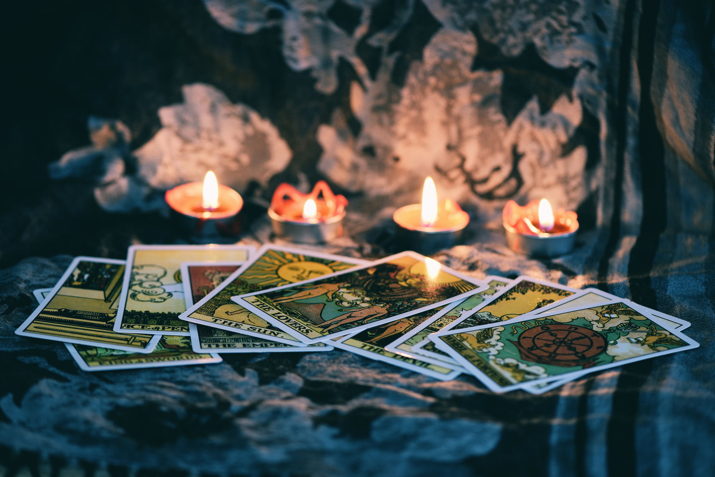 Tarot Card with Candlelight on the Darkness